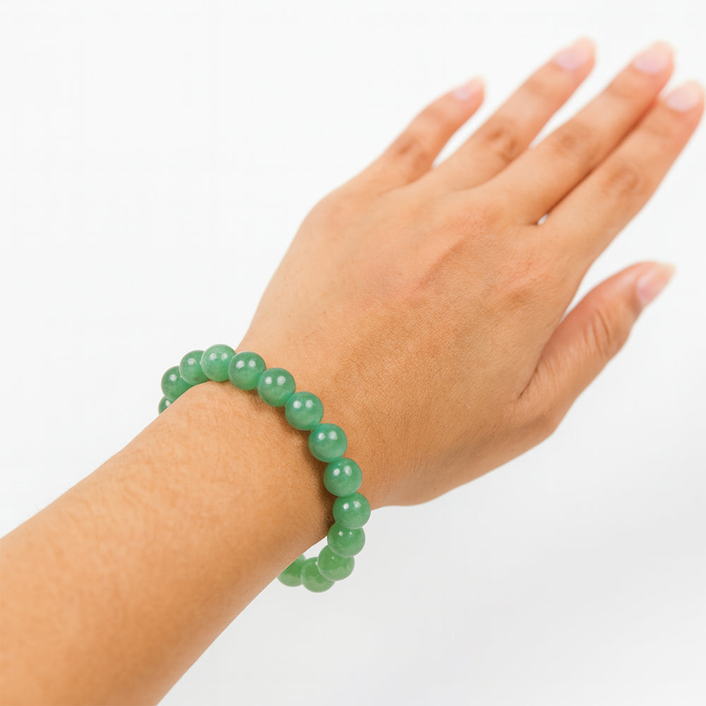 Green Aventurine bracelet on wrist for luck — Maayam India